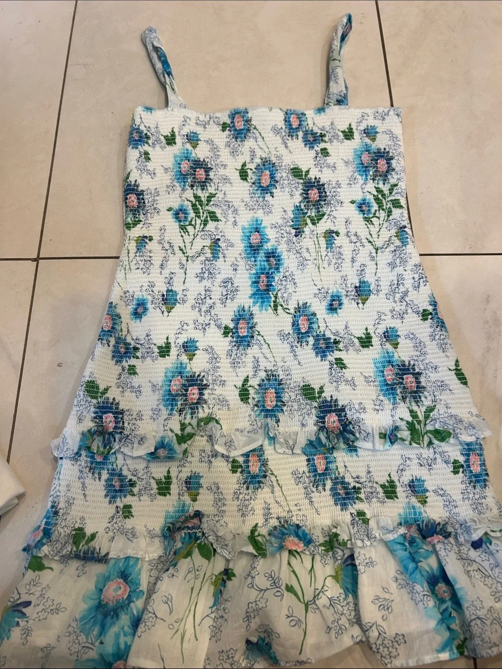 LoveShackFancy light blue knit top with pastel accents